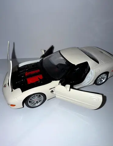 Die-cast model of a white Corvette