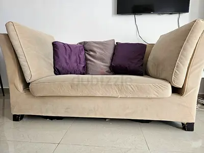 Throw away price - Comfortable Beige Sofa with Decorative Pillows for sale
