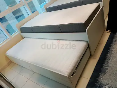 Ikea slakt bed frame with under bed and 2 storage drawers underneath with 2 Ikea mattresses