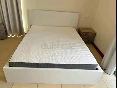 IKEA malam king‑size bed (180 × 200 cm) with 2 storage drawers underneath and an IKEA mattress