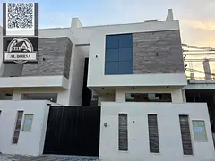 🏠 Townhouse for sale in Al Helio 2, Ajman: 5 master bedrooms, majlis, and living room with a mode