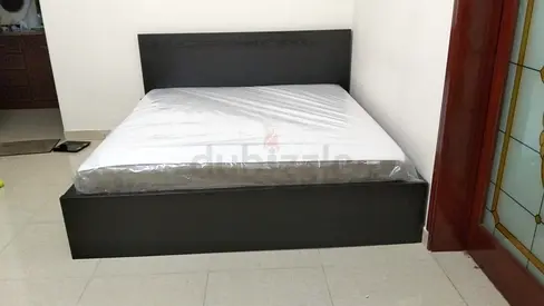 Ikea Black Bed Frame with Storage and Mattress.