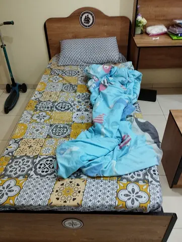 Cozy Single Beds with Colorful Bedding