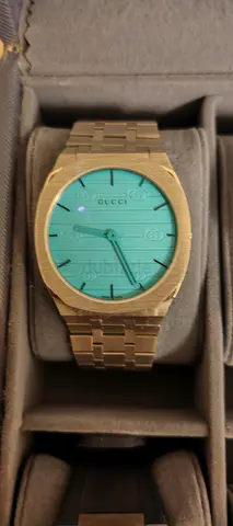 Stylish Gucci Watch with Bold Aqua Face