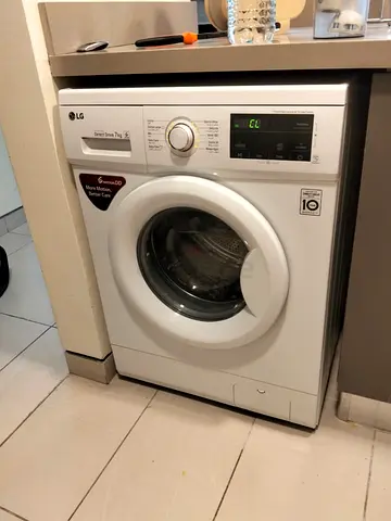 LG like new washing machine very good working 7 kg delivery with warranty