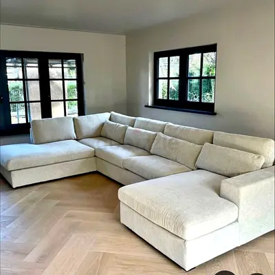Spacious L-Shaped Sofa in Neutral Fabric