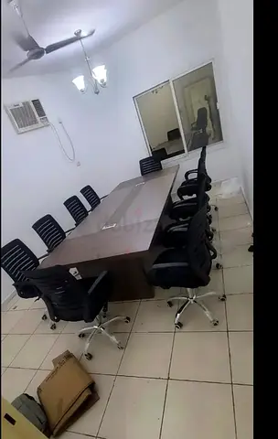 Stylish Office Conference Table with Ergonomic Chairs