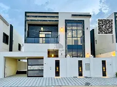 A villa on the main street, ready to move in, in one of Ajman's most prestigious areas. Freehold