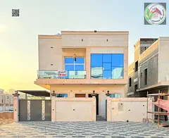 A distinctive two-story villa with a roof for sale in Ajman, Al Helio 2 area, at an attractive price