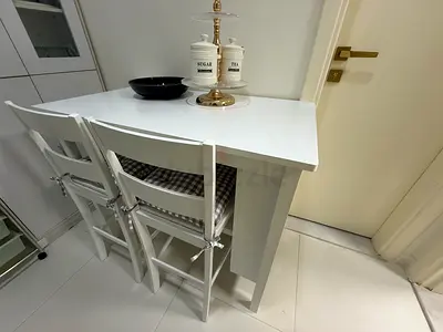 Stylish White Dining Table with Chairs