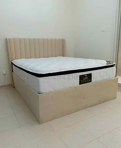 Comfortable King-Size Bed with Luxurious Headboard