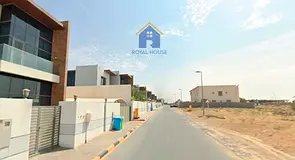 Land for sale in Al Hoshi corner plot