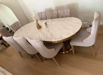Elegant Oval Dining Table with Plush Chairs
