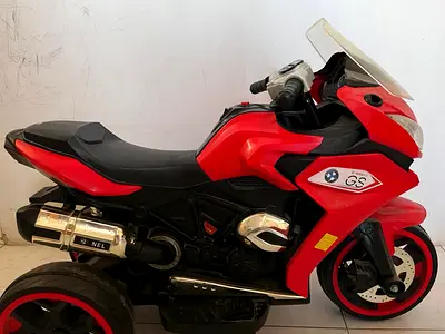 Red electric motorcycle kids