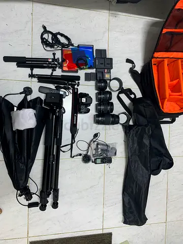 Canon EOS 250D + 18-55mm+ 10-18mm+50mm+75-300mm along with lot free items on the last slide