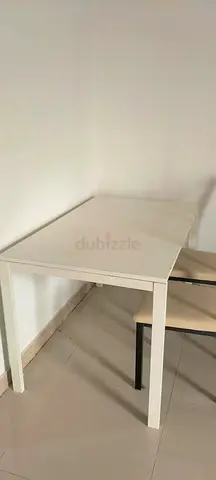 table with 2 chair in najda street abu dhabi