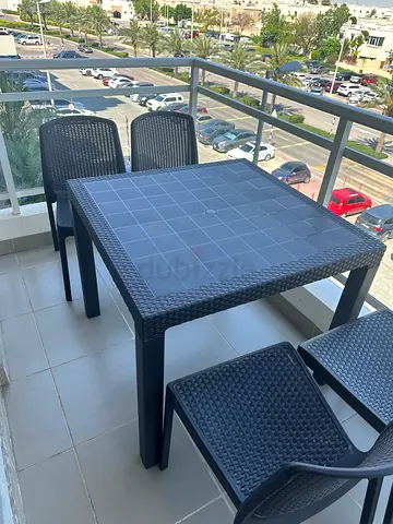 Modern Four-Piece Outdoor Dining Set
