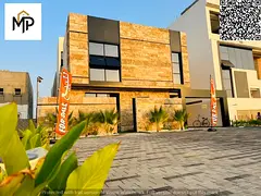 Luxury villa for sale in Al Bahia, Ajman | 6 master bedrooms | Majlis and living room | Includes reg