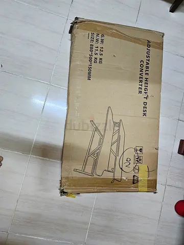 Adjustable height desk converter