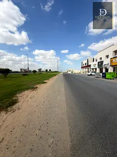 For Sale in Sharjah Al Hooshi Area Commercial Land Directly on Maliha Road Corner Plot on Three Stre