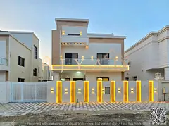 A modern villa for sale in Al Yasmin, Ajman. Two floors plus a roof terrace, next to a mosque and sh