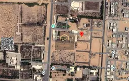 Two prime residential townhouse plots for sale on Al Helio 2 Street, Ajman. Freehold ownership avail