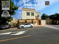 Villa for sale in Al Rawda 3, Ajman. 5 bedrooms, living room, majlis, maid's room, and spacious 