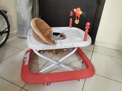 Gently Used Baby Walker with Activity Center