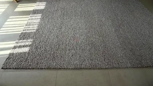 HM wool rug 250x180cm 600 aed