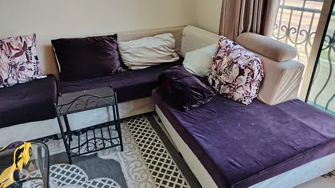 Cozy L-Shaped Sofa with Decorative Cushions