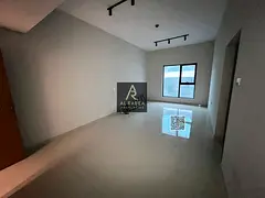 A very spacious apartment in a large tower in a prime location in Al Rashidiya 1. 2 bedrooms, a livi