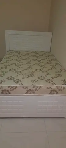 Stylish White Bed Frame with Mattress