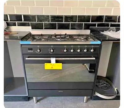 Smeg 90cm top gass oven electric cooking range