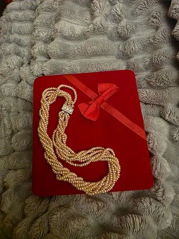 Elegant Multi-Strand Pearl Necklace with Box. Never Worn. Worth Over AED 6K. Selling: AED 1,900.