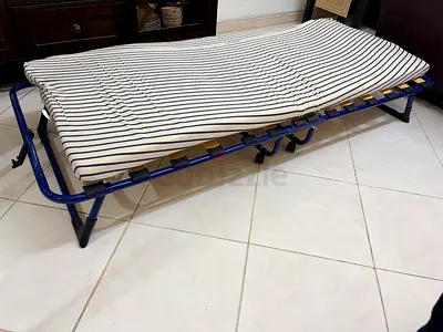 Comfortable Folding Bed with Striped Mattress