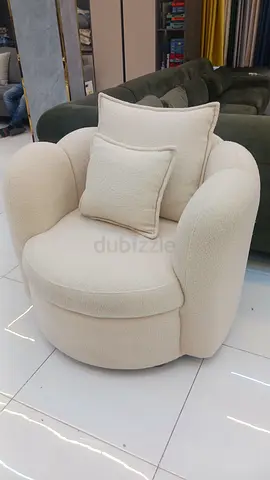 Stylish Cream Swivel Armchair with Cushions