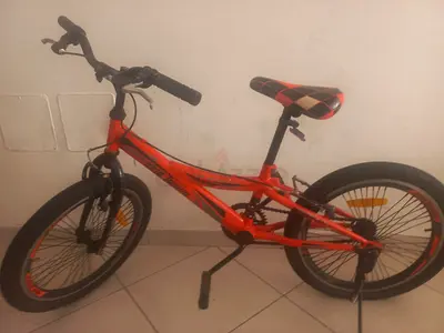 Well-Maintained Orange Childrens Bike for Sale