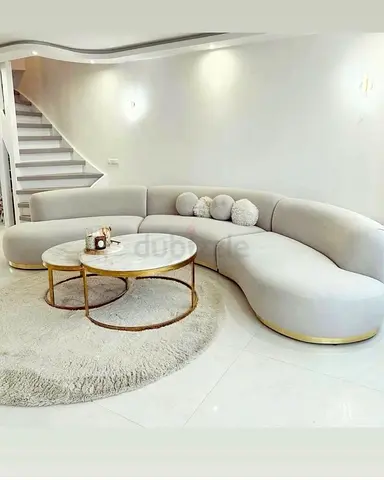 Elegant Curved Sofa with Round Marble Coffee Table