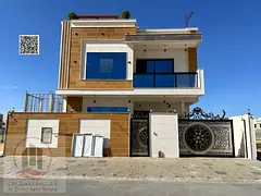 Villa for sale in Al Bahia, Ajman. Modern design. The villa includes registration fees and features