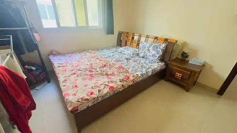 Cozy Wooden Bed with Nightstand