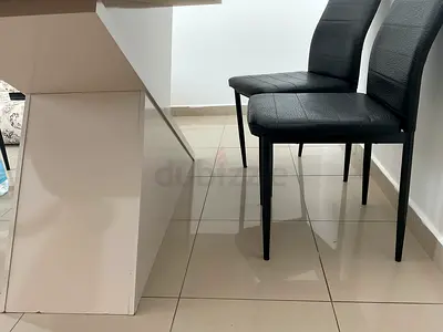 Get FREE Black Dining Chairs if you purchase big White Dining Table.