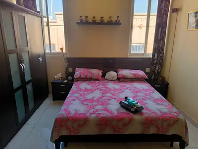 Cozy and Stylish Bed with lamp and side table from PAN Emirates