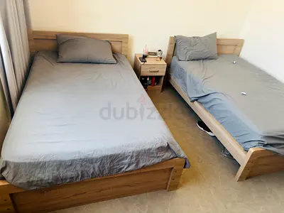 Comfortable Twin Beds with Nightstand