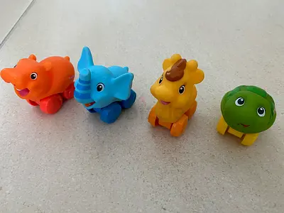 Set of 4 Playskool Push Animals