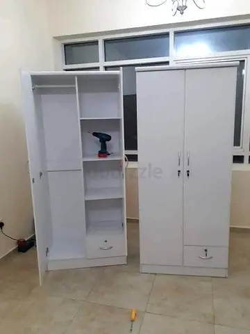 Brand new 2 door cabinet with glass door