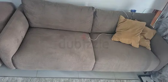 Comfortable Beige Sofa with Cushions