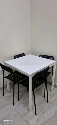 Stylish Square Dining Table with Four Chairs