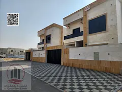 Villa for sale in Al Helio area, Ajman. Modern design. The villa includes registration fees and feat