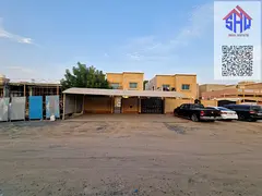 Villa for sale in Al Muwaihat area, next to a mosque and opposite an amusement park. Includes water,