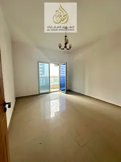 Two-bedroom apartment with a living room for annual rent in Al Nuaimiya 3, directly on Sheikh Khalif